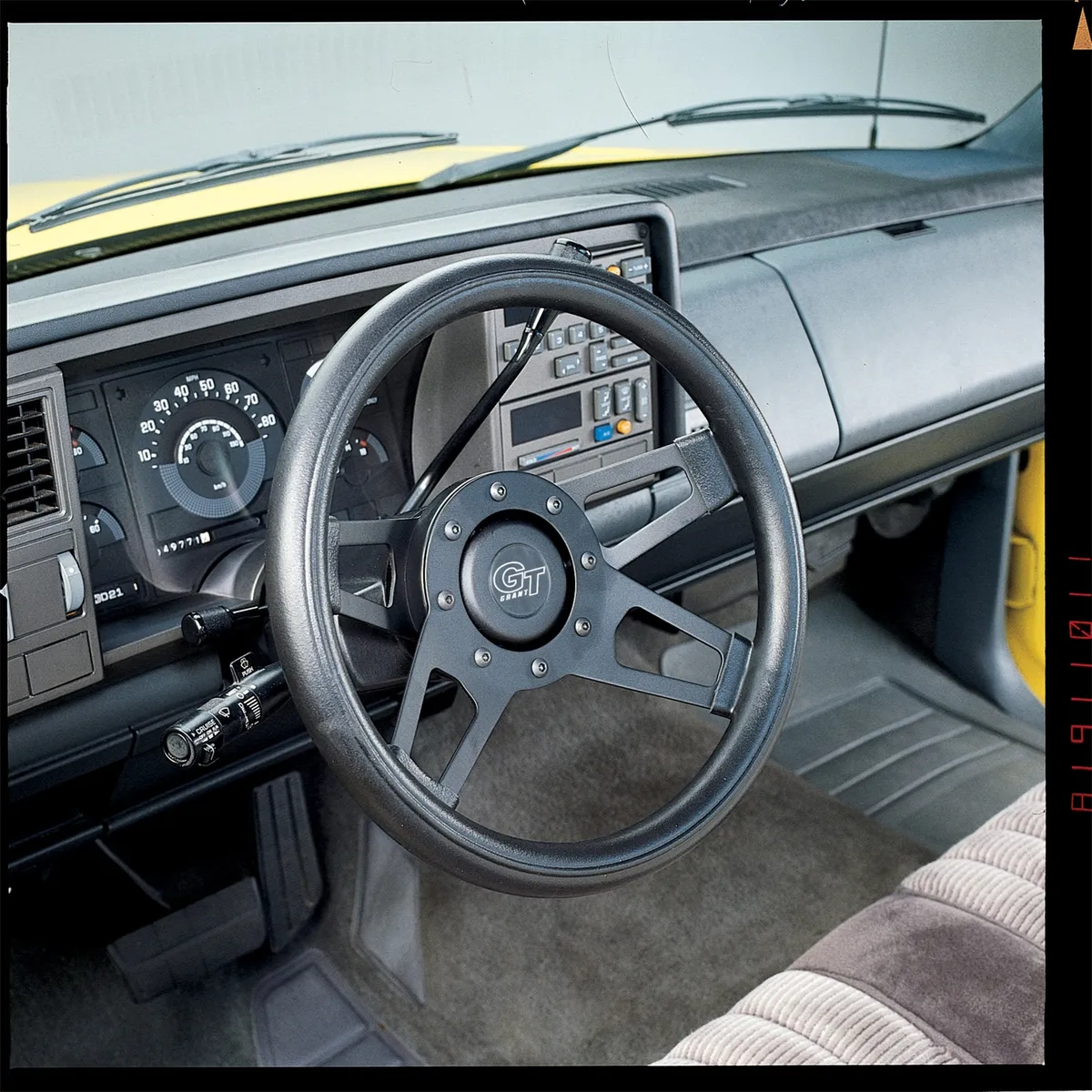 Challenger Steering Wheel; 13 1/2 in. Diameter; 3 in. Dish; Black Cushion Grip; Matte Black Dual Plane Spokes; product image