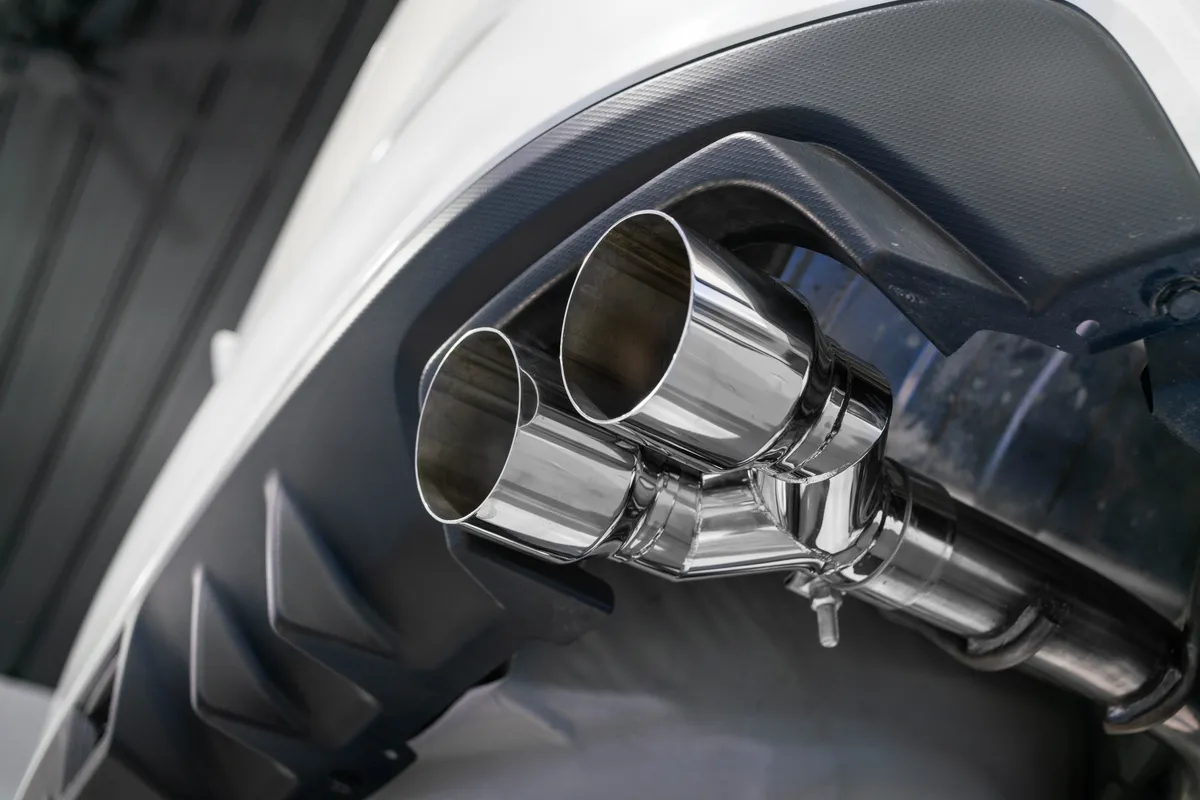 Armor Pro Axle Back Exhaust System; 2.5 in.; Dual Split Rear Exit; T304 Stainless Steel; Incl. 3.5 in. OD Dual Out Carbon Fiber Tips; product image