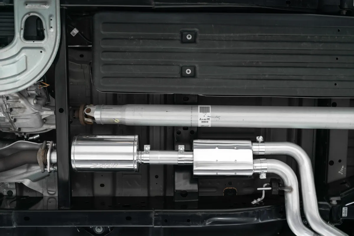 Armor BLK Cat Back Exhaust System; 3 in.; Incl. Front Pipe/Ext. Pipe/Muffler/Tailpipe/Hardware/4 in. OD Tip; Pre-Axle Dual Outlet; Street Version; Black Coated; product image