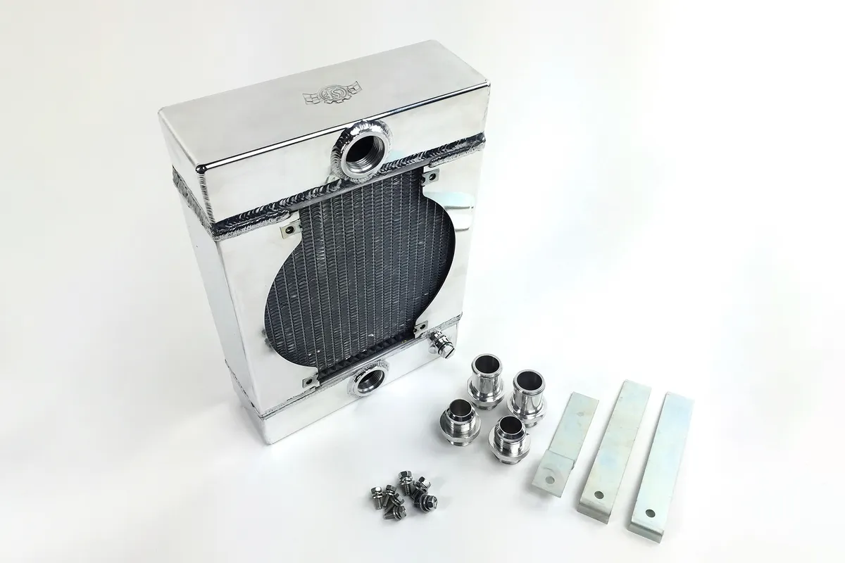 Universal Drag Race / Tuck Radiator -10.5H" x 10L" x 3.6W" (5.65" w/fan) - Includes 9-inch SPAL fan - Includes inlet/outlet kit (1.25 or -16) + installation brackets product image
