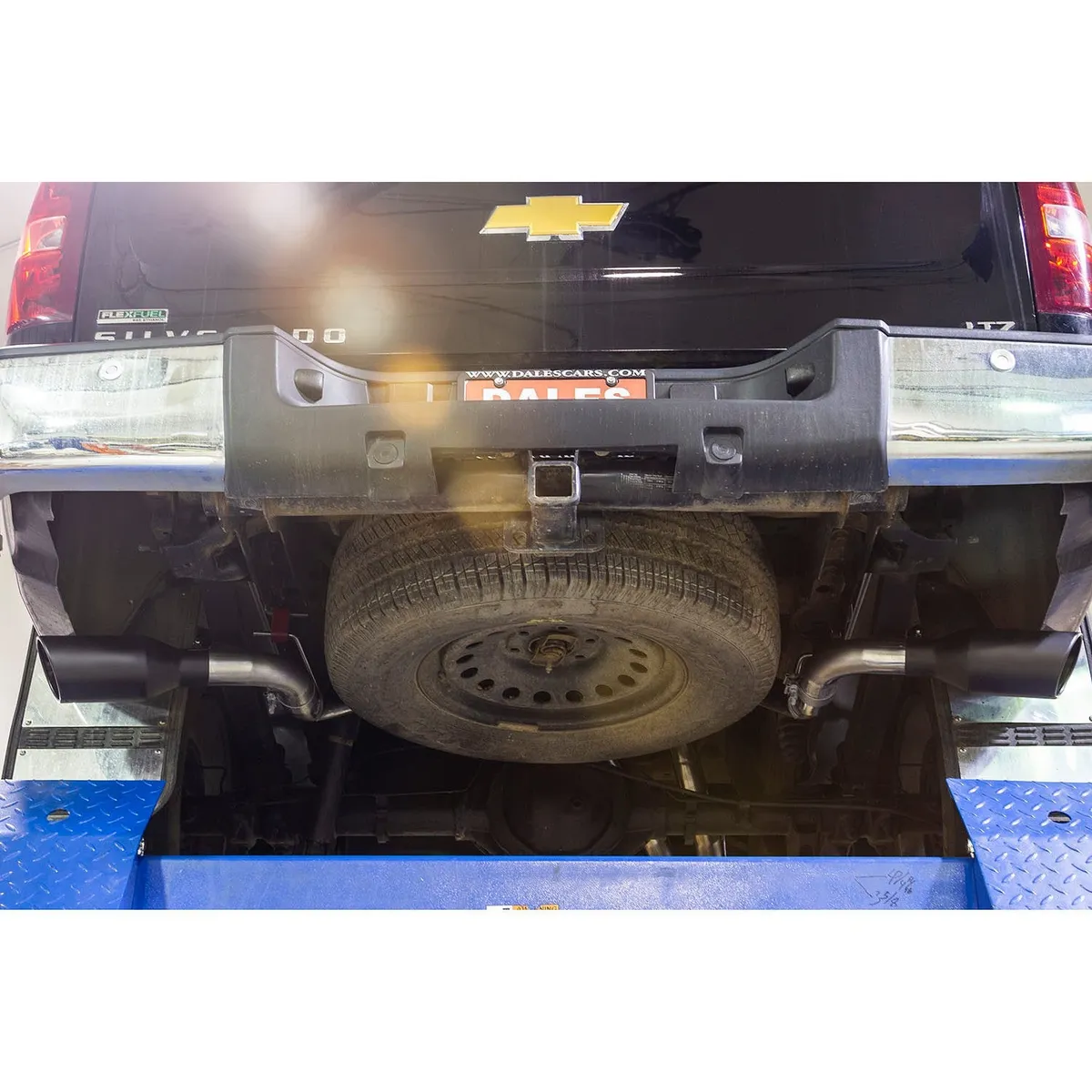 09-13 GM SilveradoSierra 12 Ton 5.3L WFlex Fuel Extended Cab and Crew Cab Only 24 Wheel Drive Cat-back 2.50 Tailpipes FlowFX Series Muffler 4.50 Black Ceramic Logo Embossed Stainless Tips FlowFX DOS Mandrel Bent Tubing 409S Stainless Ste product image