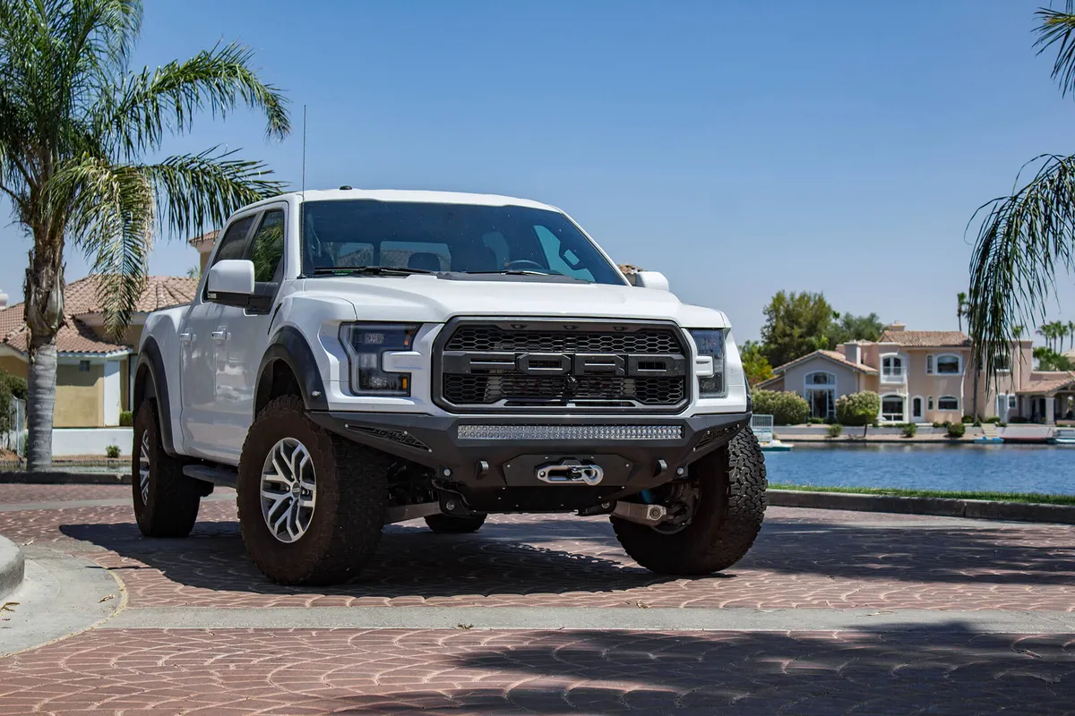 Ford Raptor 2017 - up Stealth Fighter Front Bumper with Winch Mount with 10 dually mountsuniversal plate on top and 10 SR mounts on outer with D-ring Clevis Mounts in Hammer Black with Satin Black panels product image