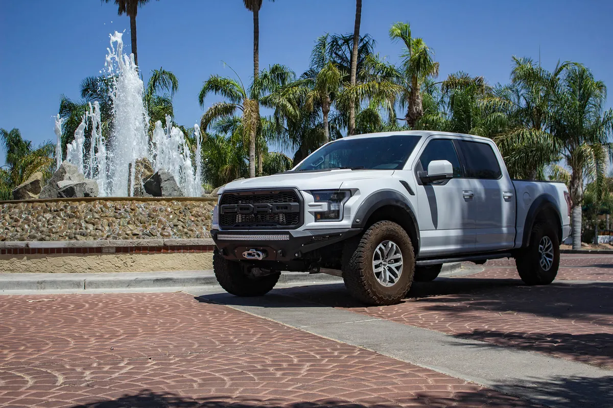 Ford Raptor 2017 - up Stealth Fighter Front Bumper with Winch Mount with 10 dually mountsuniversal plate on top and 10 SR mounts on outer with D-ring Clevis Mounts in Hammer Black with Satin Black panels product image