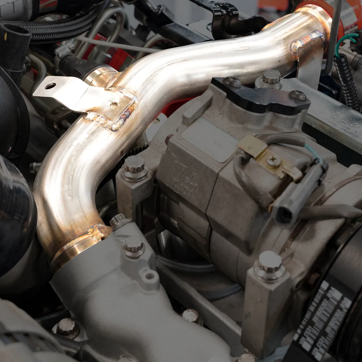 304 Stainless Steel Engine Coolant Return Pipe LLY 2004.5-2005 - Polished product image