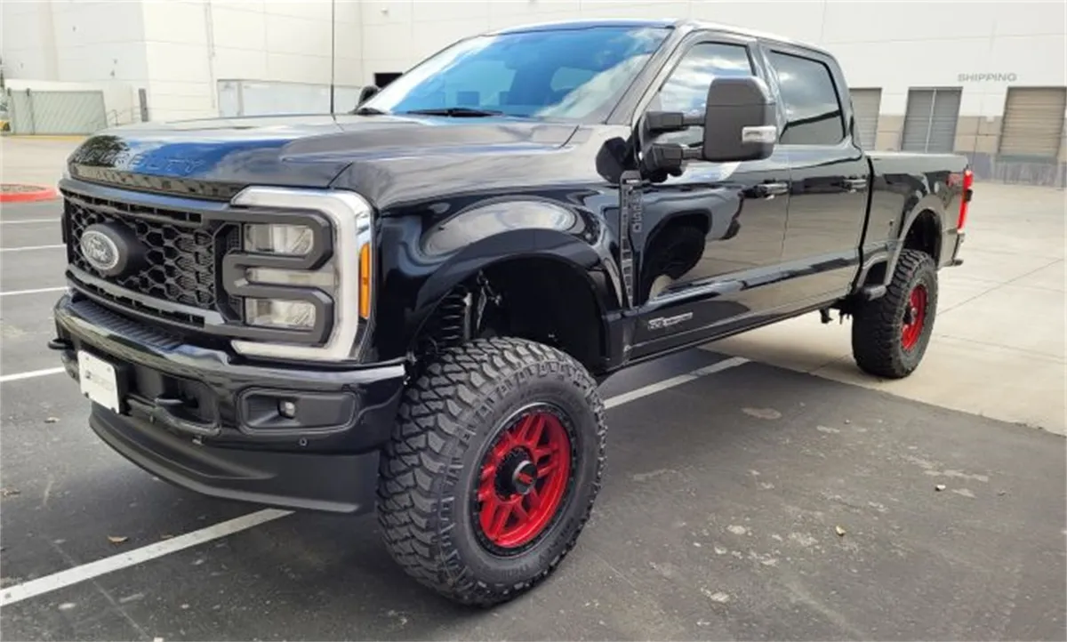 4ft. Coil Spring Lift Kit with Falcon 3.3 Front/Rear Shocks; Radius Arms; Dual Steering Stabilizer; and Front Track Bar Bracket product image