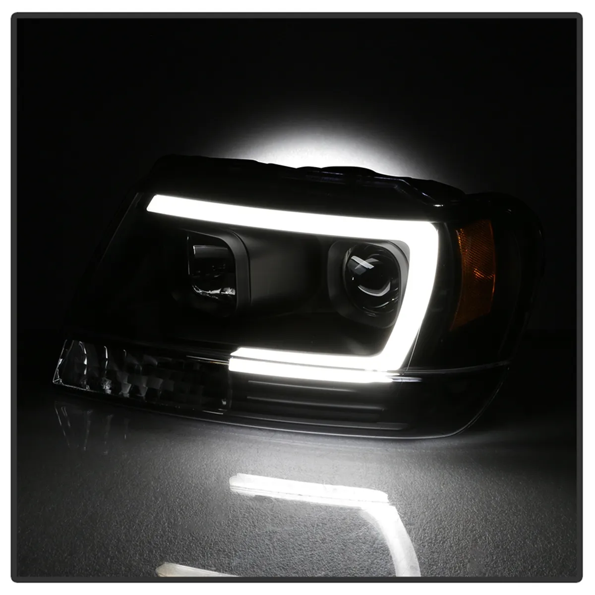 ( Spyder Signature ) Jeep Grand Cherokee 99-04 Version 2 Light Bar Projector Headlights - Black product image