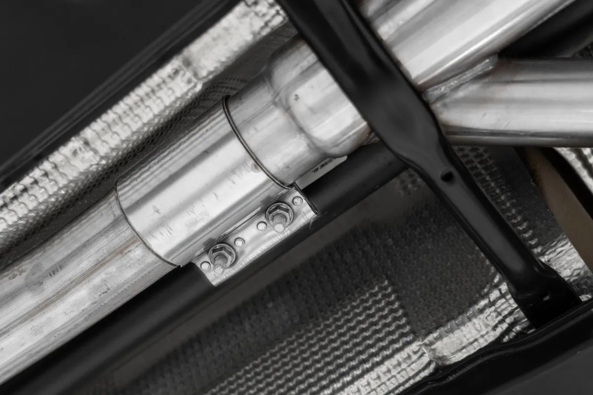 Armor Pro Cat Back Exhaust System; 3 in.; Quad Split Rear Exit; Valve Delete; Quad 4.5 in. Carbon Fiber Tips; 304 Stainless Steel; product image