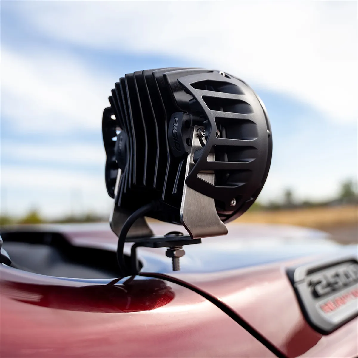 This RIGID A-Pillar mount kit is designed for the 2019+RAM 2500 and 3500; it includes two A-Pillar mounting brackets; two 6 inch 360-Series Amber Backlight Drive lights; two black light covers; two amber light covers; and a wiring harness. product image